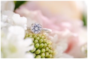 Close-up ring photo with flowers during a Maine Lighthouse Elopement